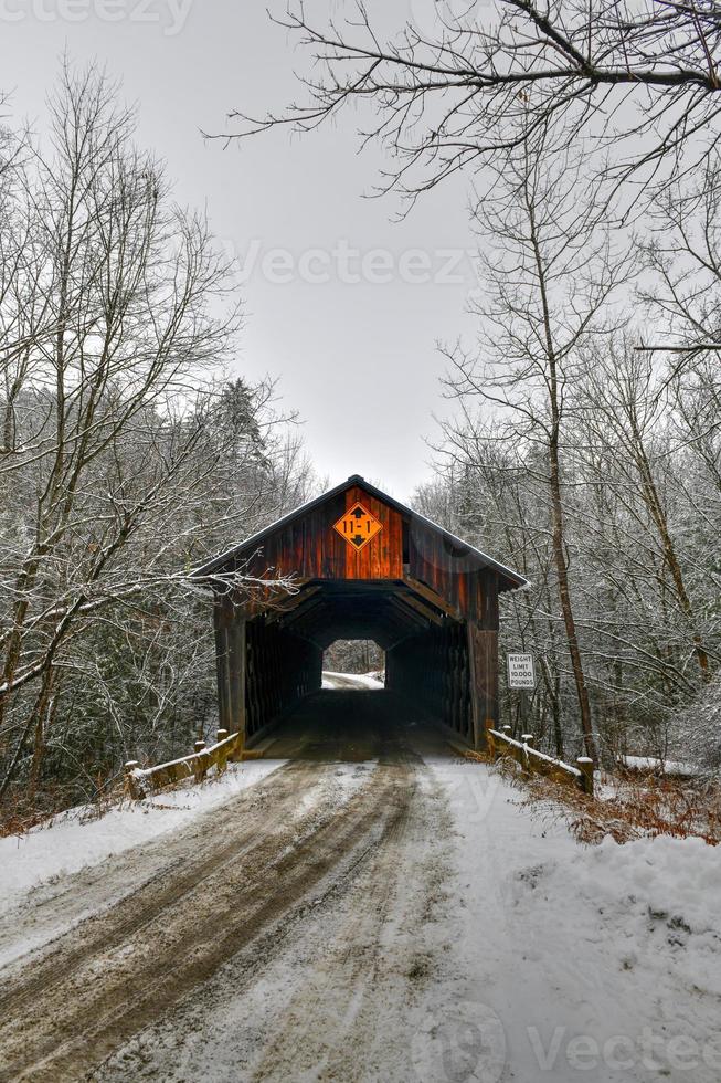 Martin's Mill Covered Bridge in Hartland, Vermont during the winter. photo