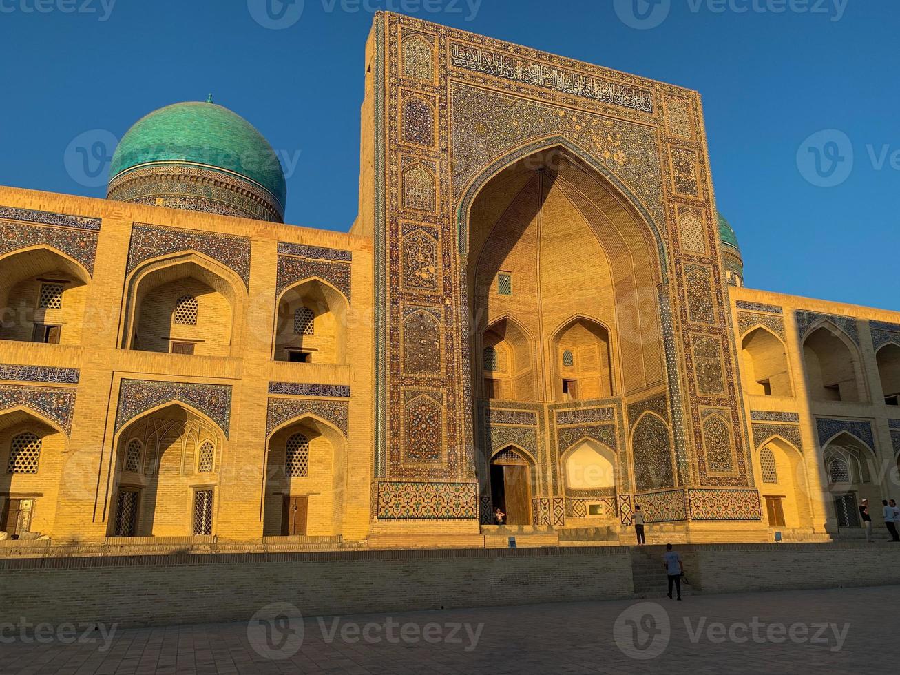 Ancient Mir-i-Arab Madrasa in the Po-i-Kalyan complex in Bukhara, Uzbekistan. photo