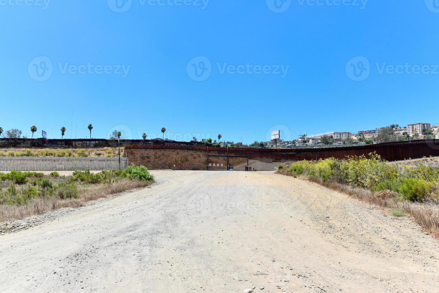 The Border Wall between the United States and Mexico from San Diego, California looking towards Tijuana, Mexico. photo