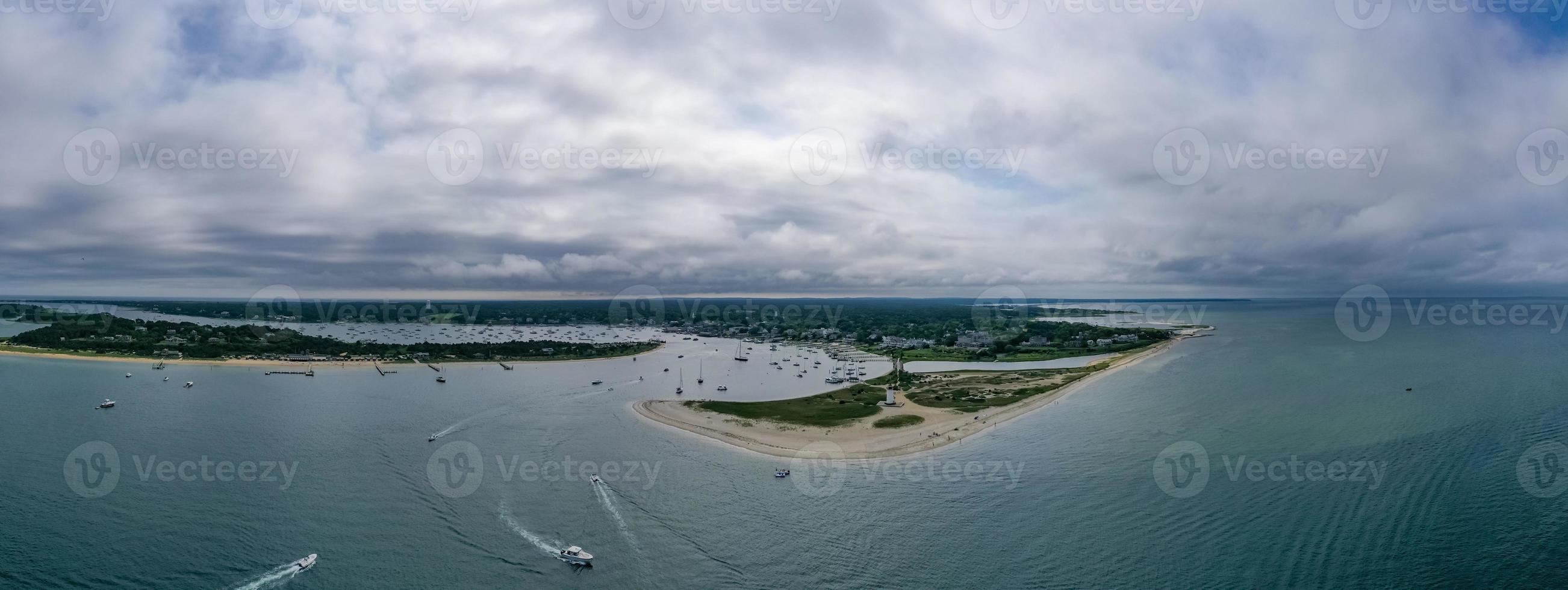Edgartown Harbor Lighthouse at the entrance into Edgartown Harbor and Katama Bay, Martha's Vineyard, Massachusetts, USA. The historic lighthouse was built in 1828. photo