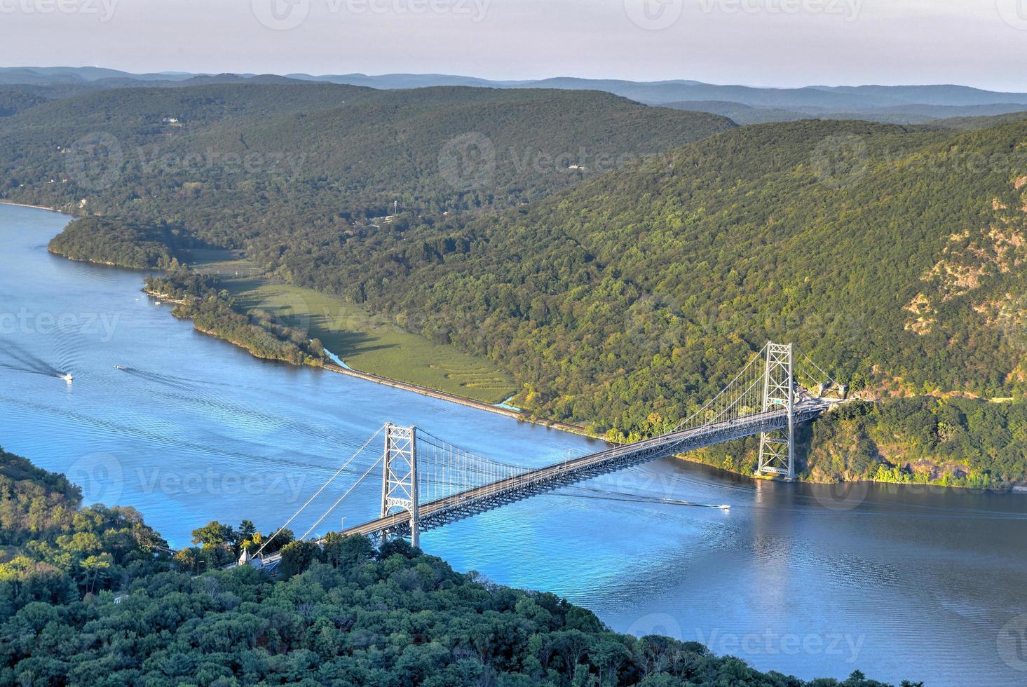 The Bear Mountain Bridge, ceremoniallynamed the Purple Heart Veterans Memorial Bridge, is a toll suspension bridge in New York State. photo