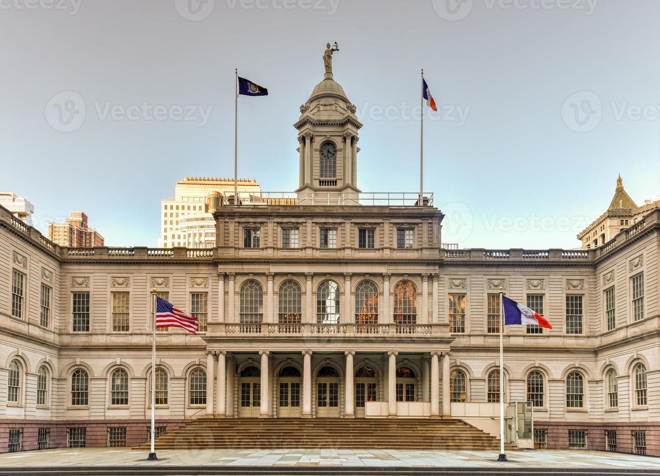 New York City Hall, the seat of New York City government, located at the center of City Hall Park in the Civic Center area of Lower Manhattan, between Broadway, Park Row, and Chambers Street. photo