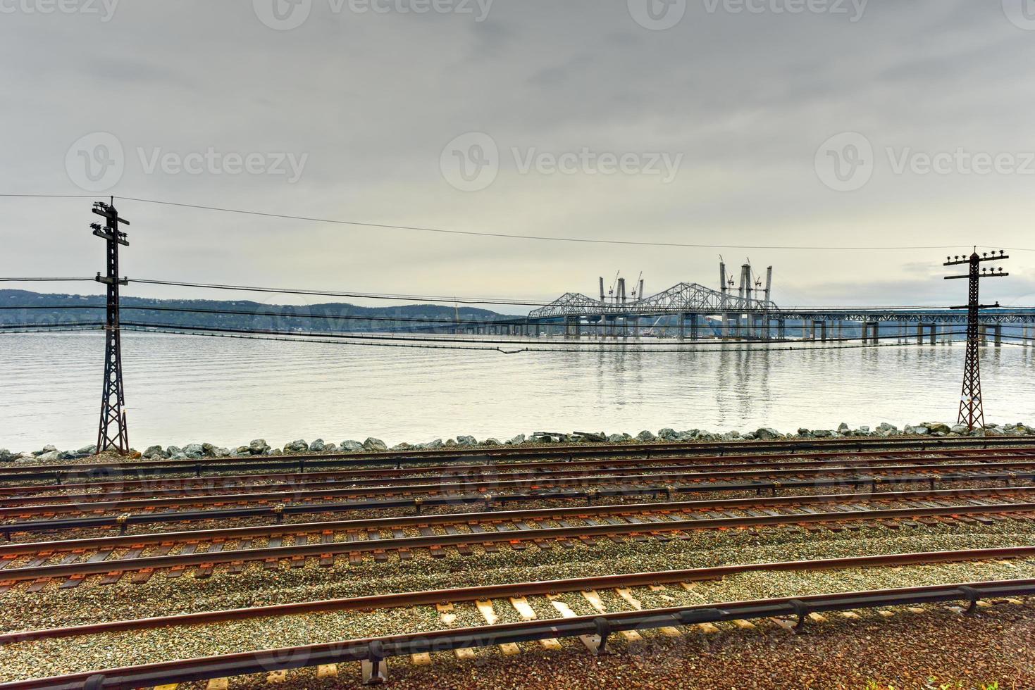 The new Tappan Zee bridge under construction across the Hudson River in New York across train tracks. photo