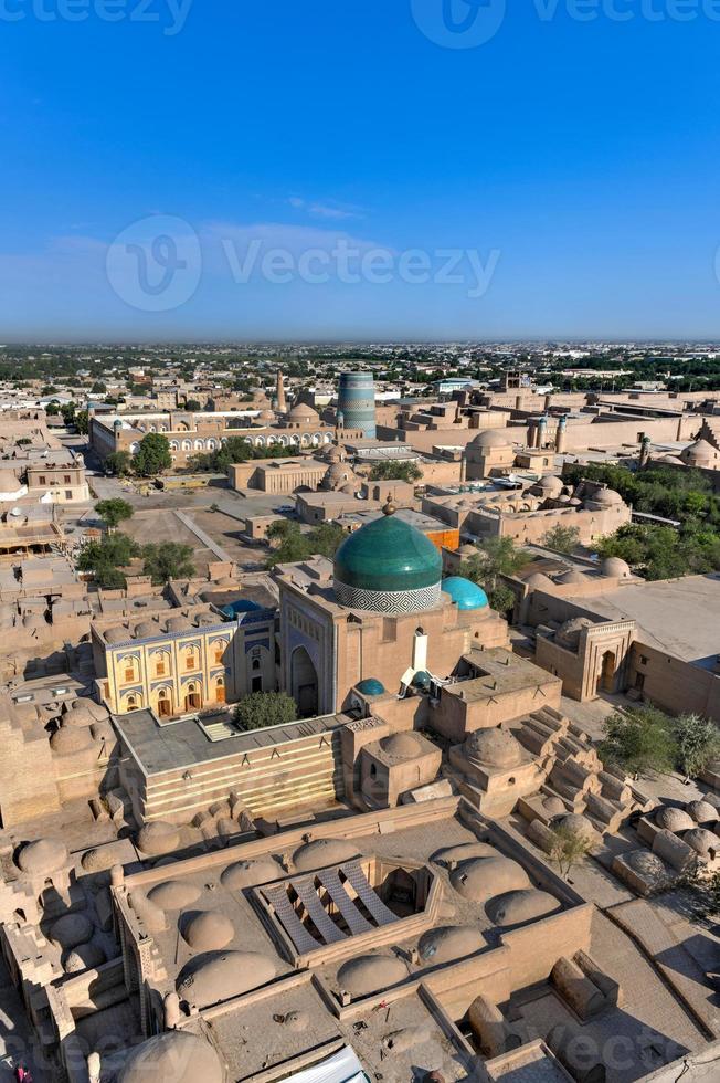 Aerial view of the architecture of the Khiva's madrassa and Islam Khoja Minaret in Uzbekistan. photo