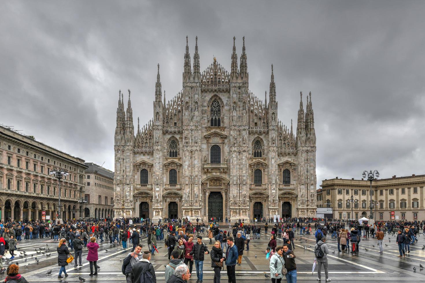 Milan, Italy - March 18, 2018 -  Milan Cathedral, Cathedral of the Nativity of the Virgin Mary - Cathedral in Milan, is located in the historic center of the city and is its symbol. photo