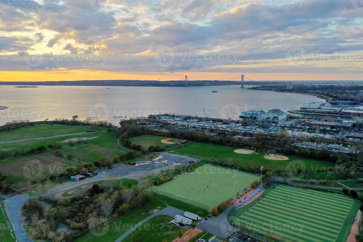 Coney Island panorama in Brooklyn, New York with a view of the Verrazano Bridge in the distance. photo