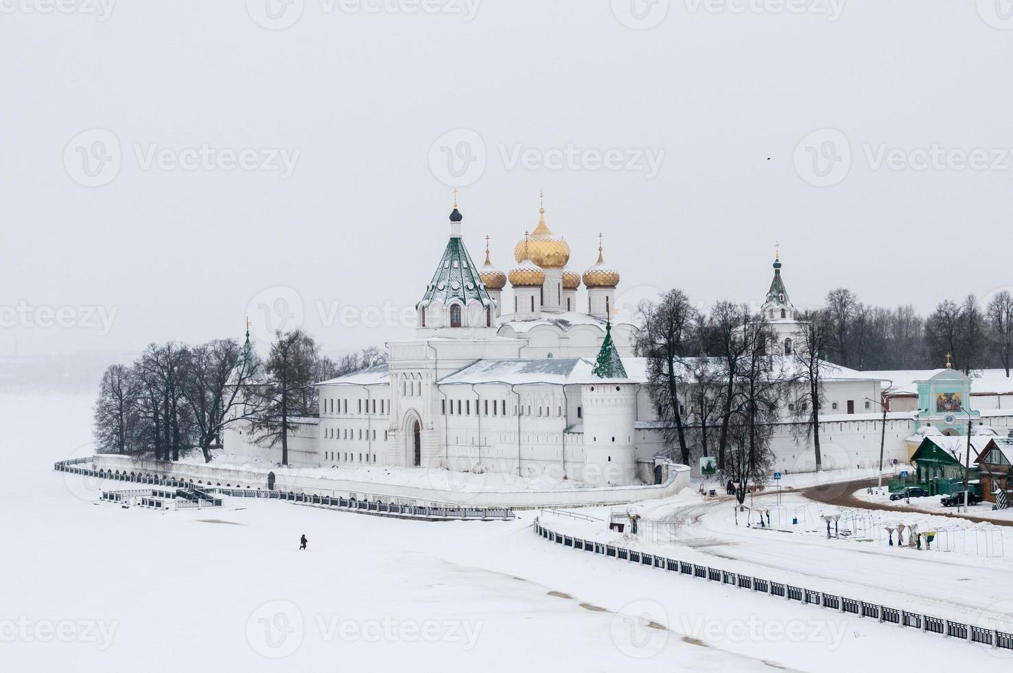 The Ipatiev Monastery, a male monastery, situated on the bank of the Kostroma River just opposite the city of Kostroma, Russia in the winter. photo