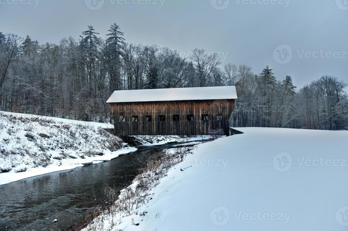 Mill Brook Covered Bridge in Hartland, Vermont during the winter. photo