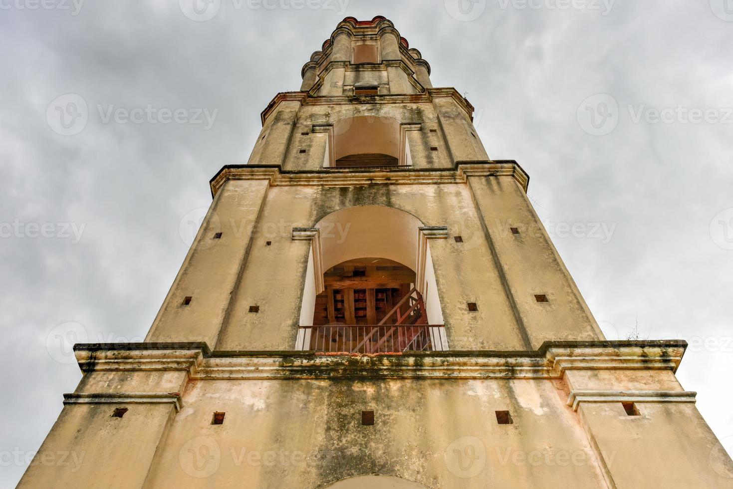 Historic slave watch tower in Manaca Iznaga, Valle de los Ingenios, Trinidad, Cuba. The Manaca Iznaga Tower is the tallest lookout tower ever built in the Caribbean sugar region. photo