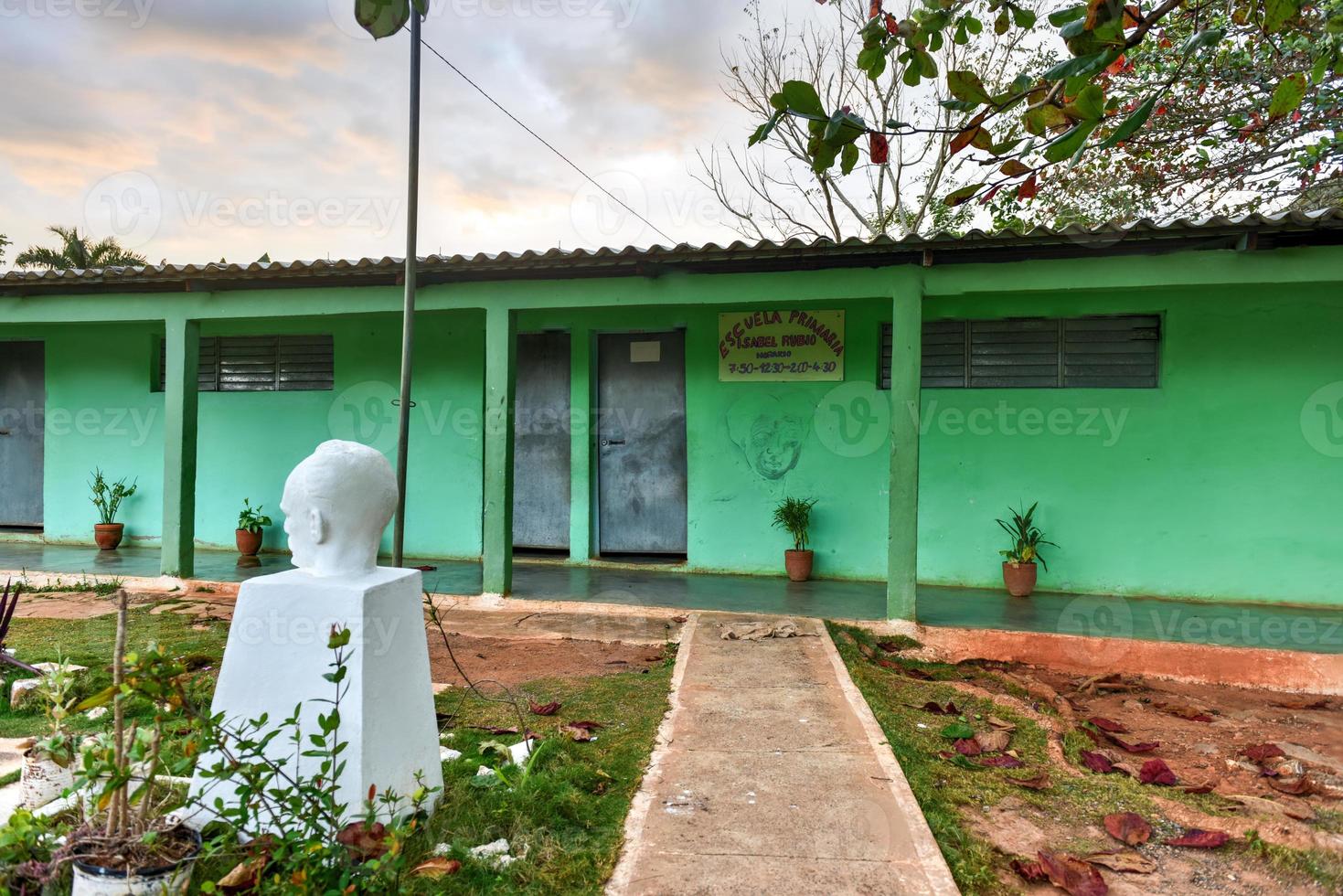 Primary School building in Vinales, Cuba with a bust of Jose de Marti. photo