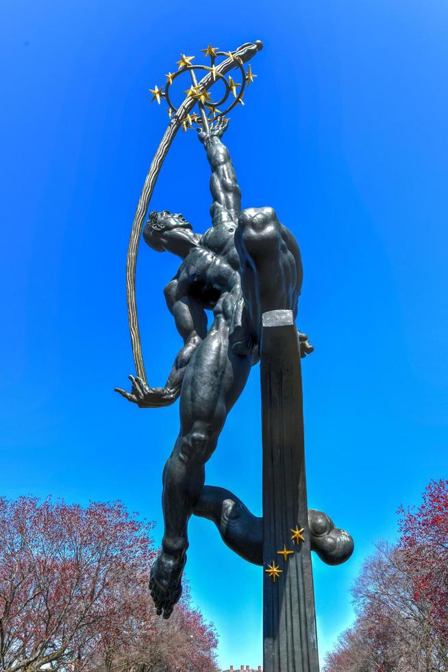 New York - Apr 21, 2018 -  Rocket Thrower massive bronze sculpture designed by Donald De Lue for the New York World's Fair of 1964-65 and currently in Flushing Meadows Corona Park, Queens, New York. photo