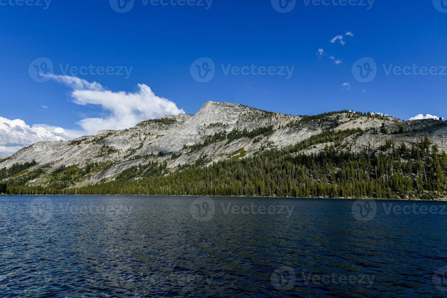 Views of Tenaya Lake, an alpine lake in Yosemite National Park, located at an elevation of 2,484 m photo