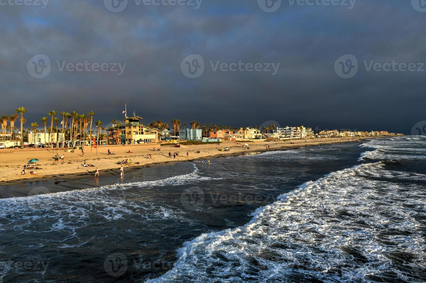 The pier and Pacific Ocean at sunset, in Imperial Beach, near San Diego, California photo