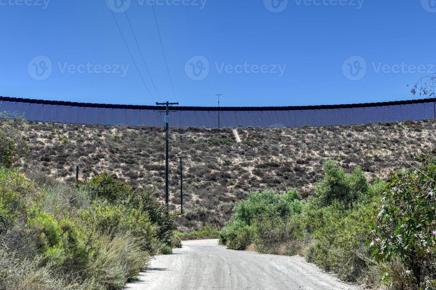 The Border Wall between the United States and Mexico from San Diego, California looking towards Tijuana, Mexico. photo