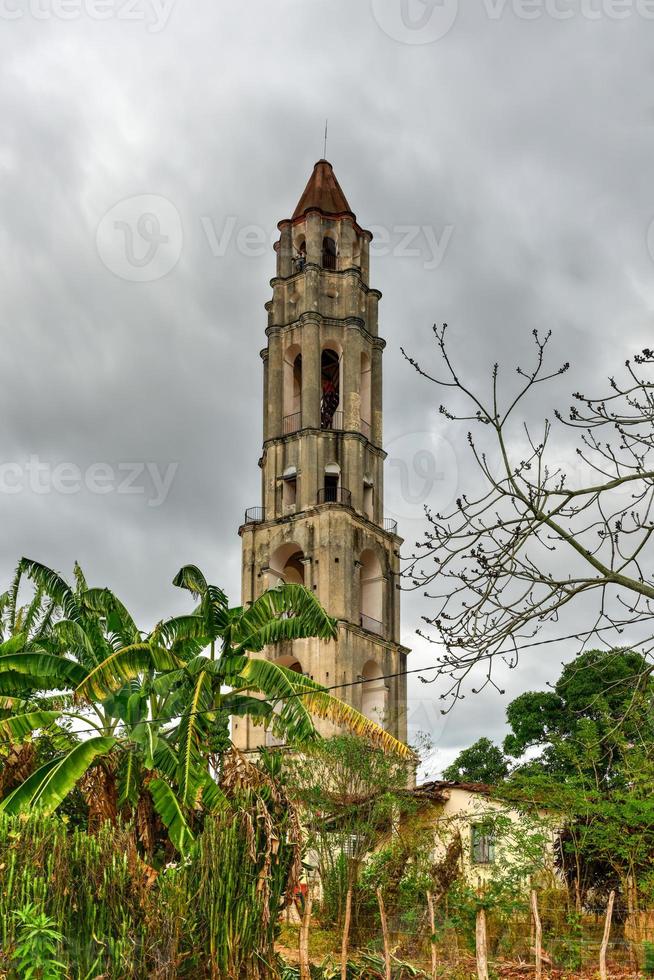 Historic slave watch tower in Manaca Iznaga, Valle de los Ingenios, Trinidad, Cuba. The Manaca Iznaga Tower is the tallest lookout tower ever built in the Caribbean sugar region. photo