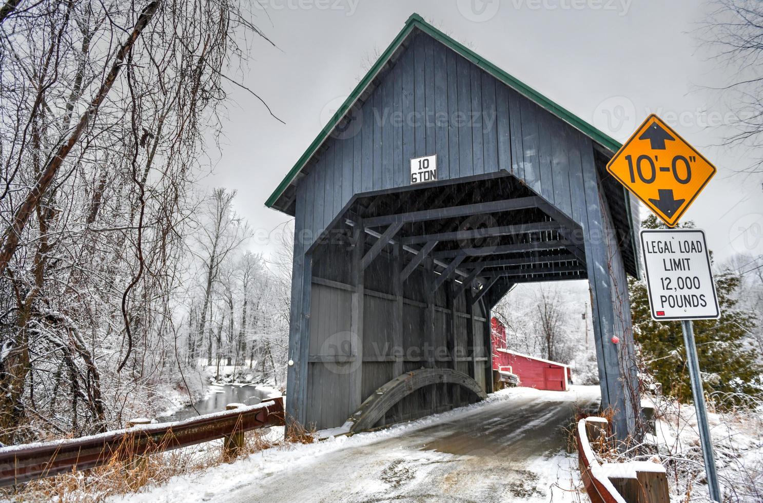 Best's Covered Bridge in Brownsville, Vermont during the winter. photo