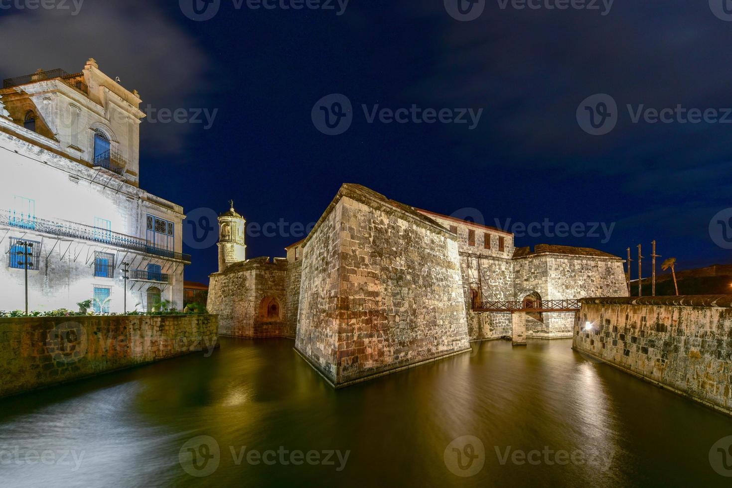 View along the moat of the Castillo de la Real Fuerza in Havana, Cuba at night. Built in the mid 16th century, the fort was the headquarters of the Spanish captains general. photo