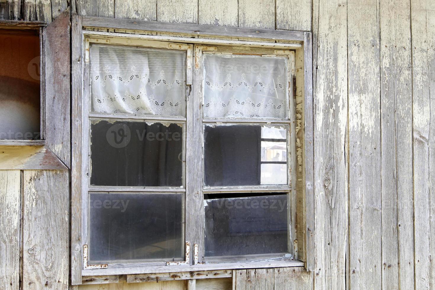 A small window in a residential building in a big city photo