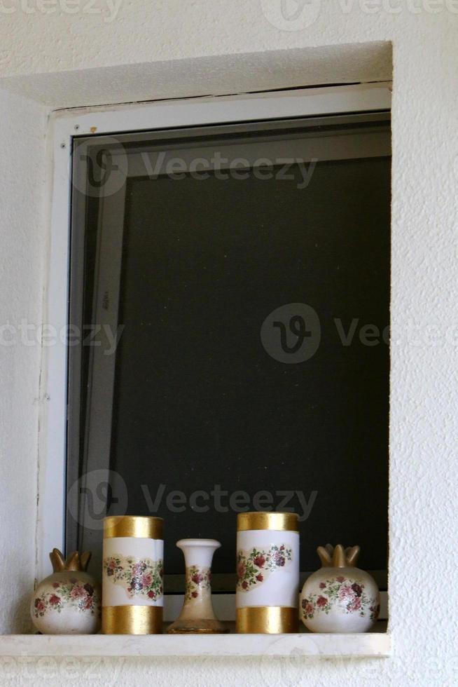 A small window in a residential building in a big city photo