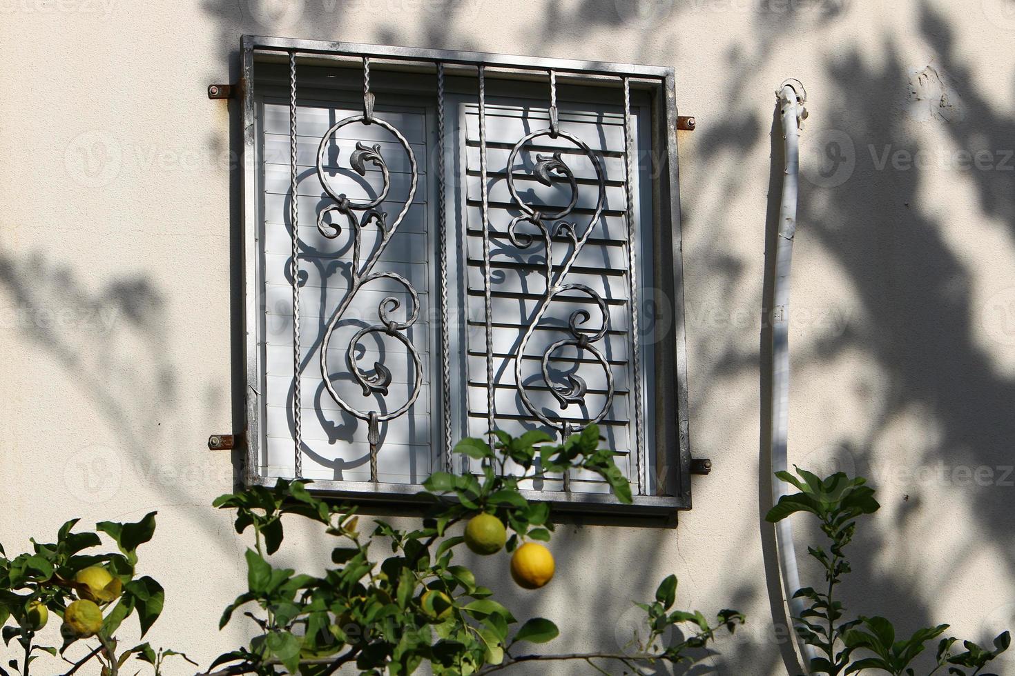 A small window in a residential building in a big city photo