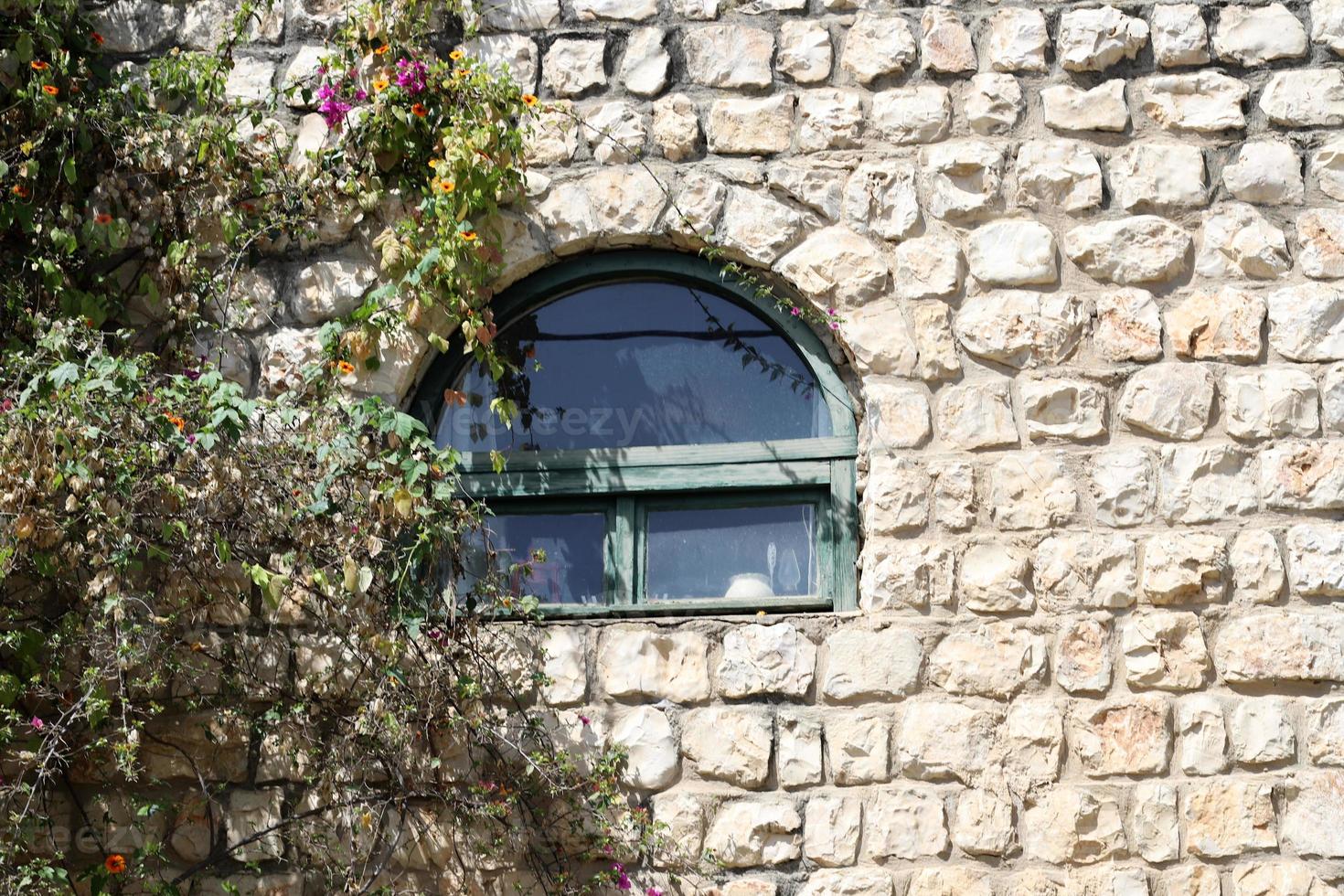 A small window in a residential building in a big city photo