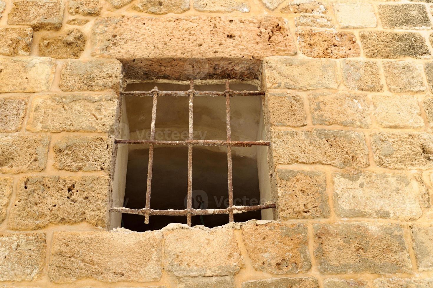 A small window in a residential building in a big city photo