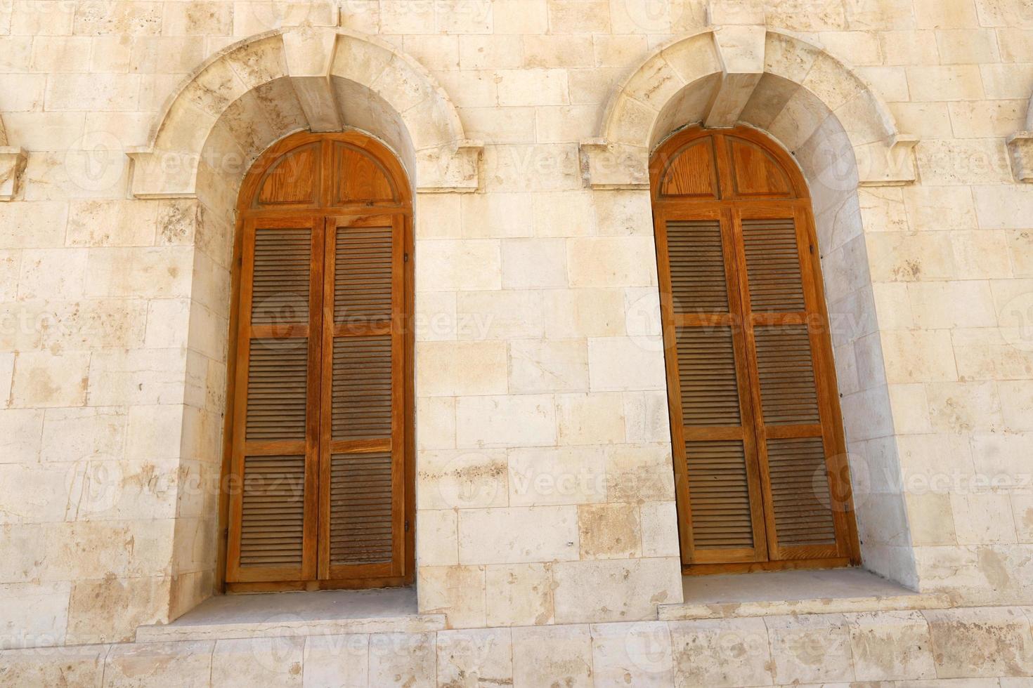 A small window in a residential building in a big city photo