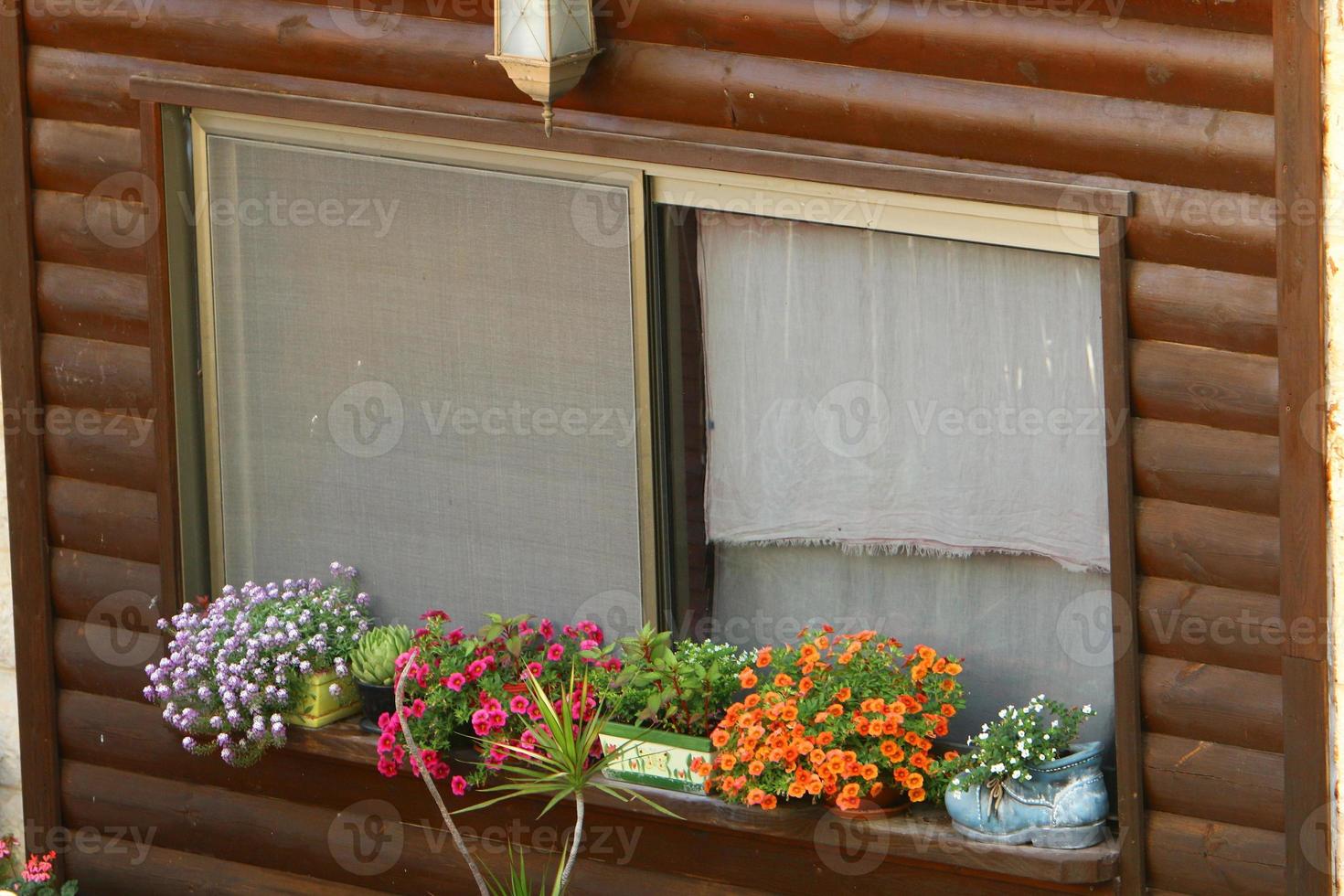 A small window in a residential building in a big city photo