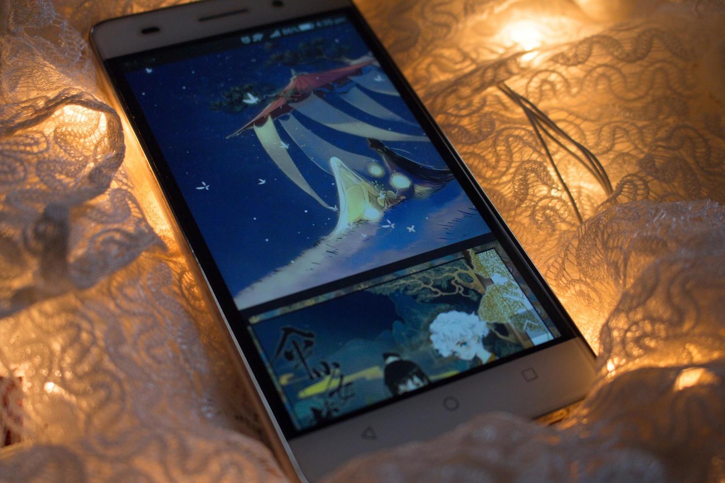 Closeup Of Smart Phone With Web Comics On It in Karachi Pakistan 2022 photo