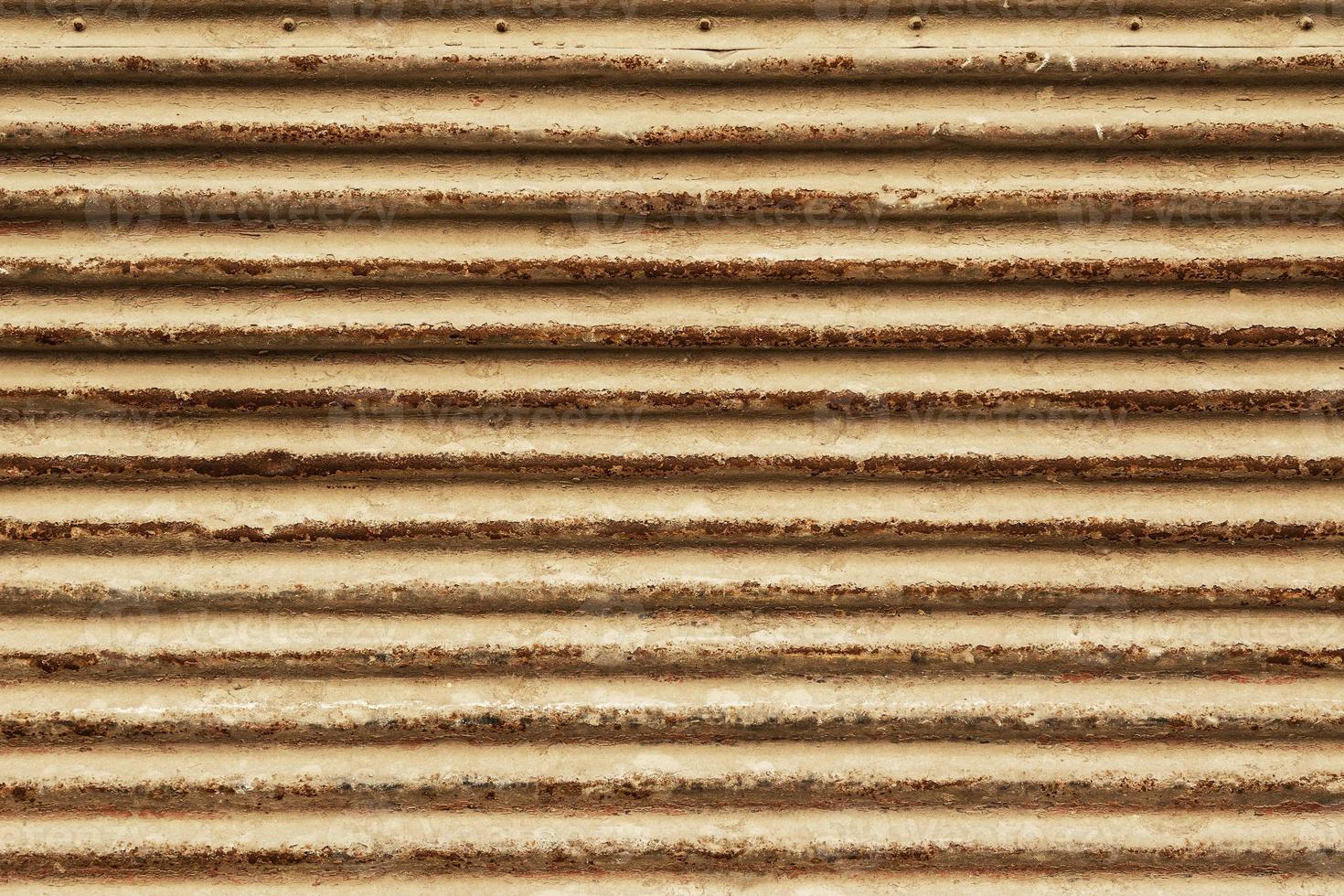 Closeup of an old corrugated metal texture photo