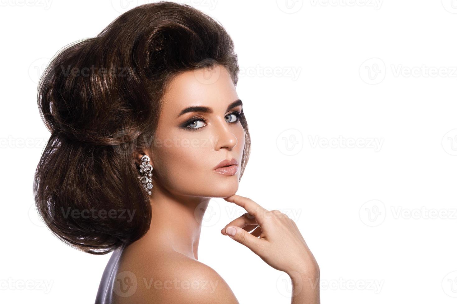 Gorgeous woman with a beautiful hairstyle and make-up photo