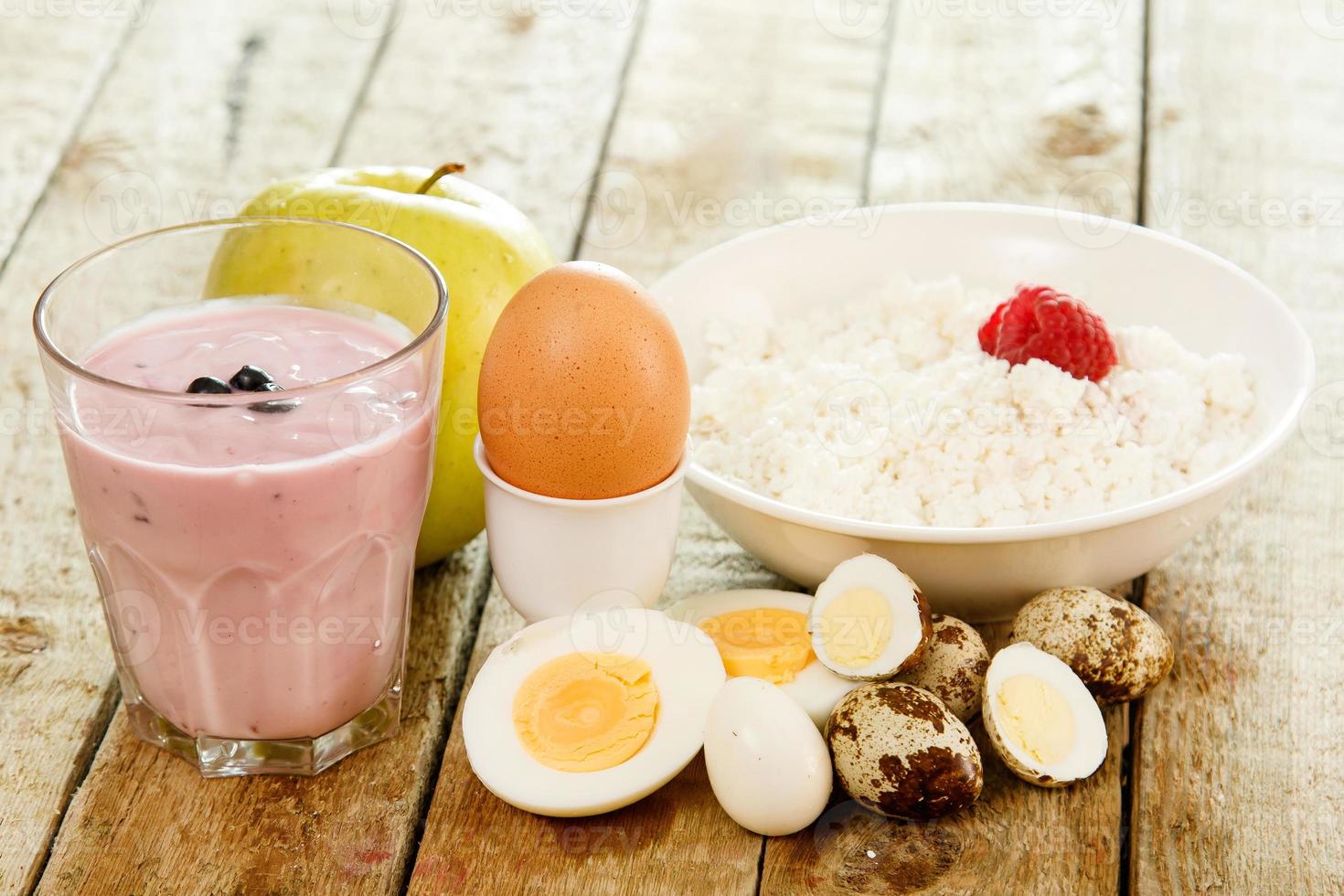 Healthy breakfast. Different food on wooden table. photo