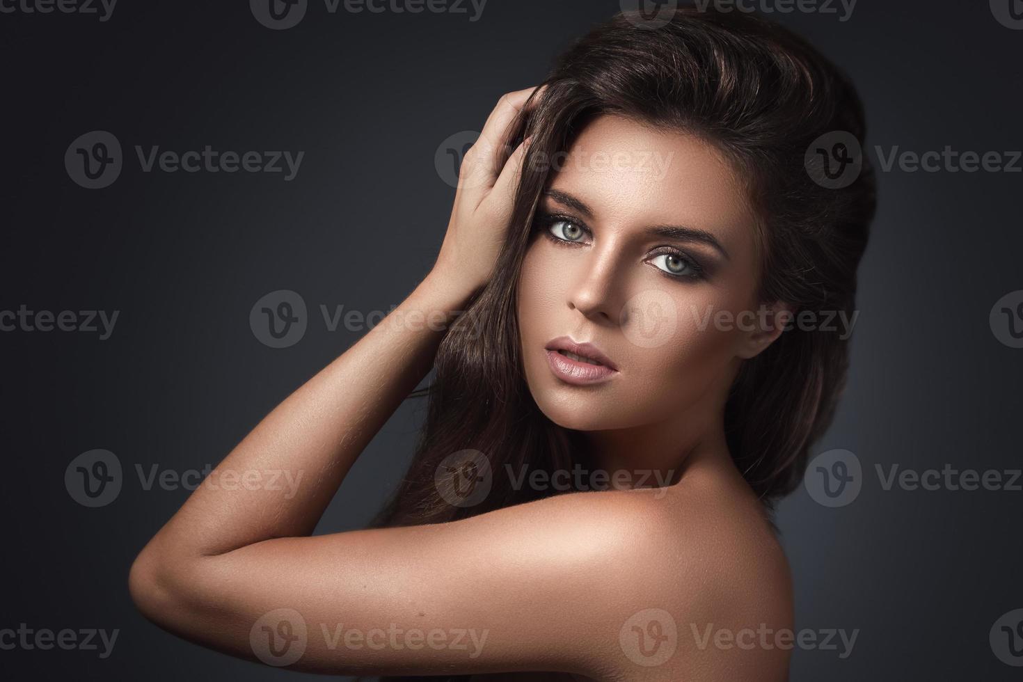 Portrait of beautiful woman with evening makeup photo