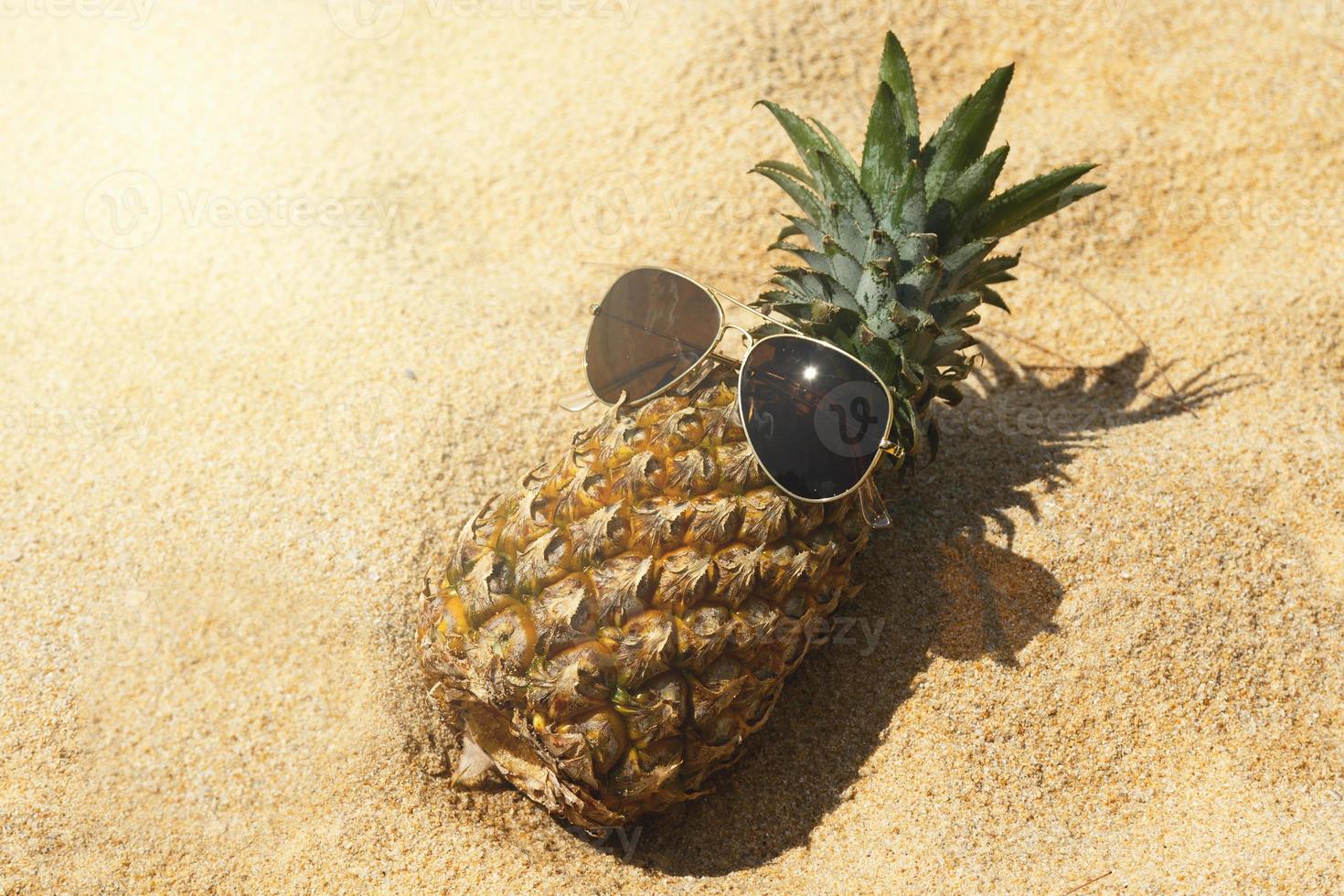 Pineapple fruit and sunglasses photo