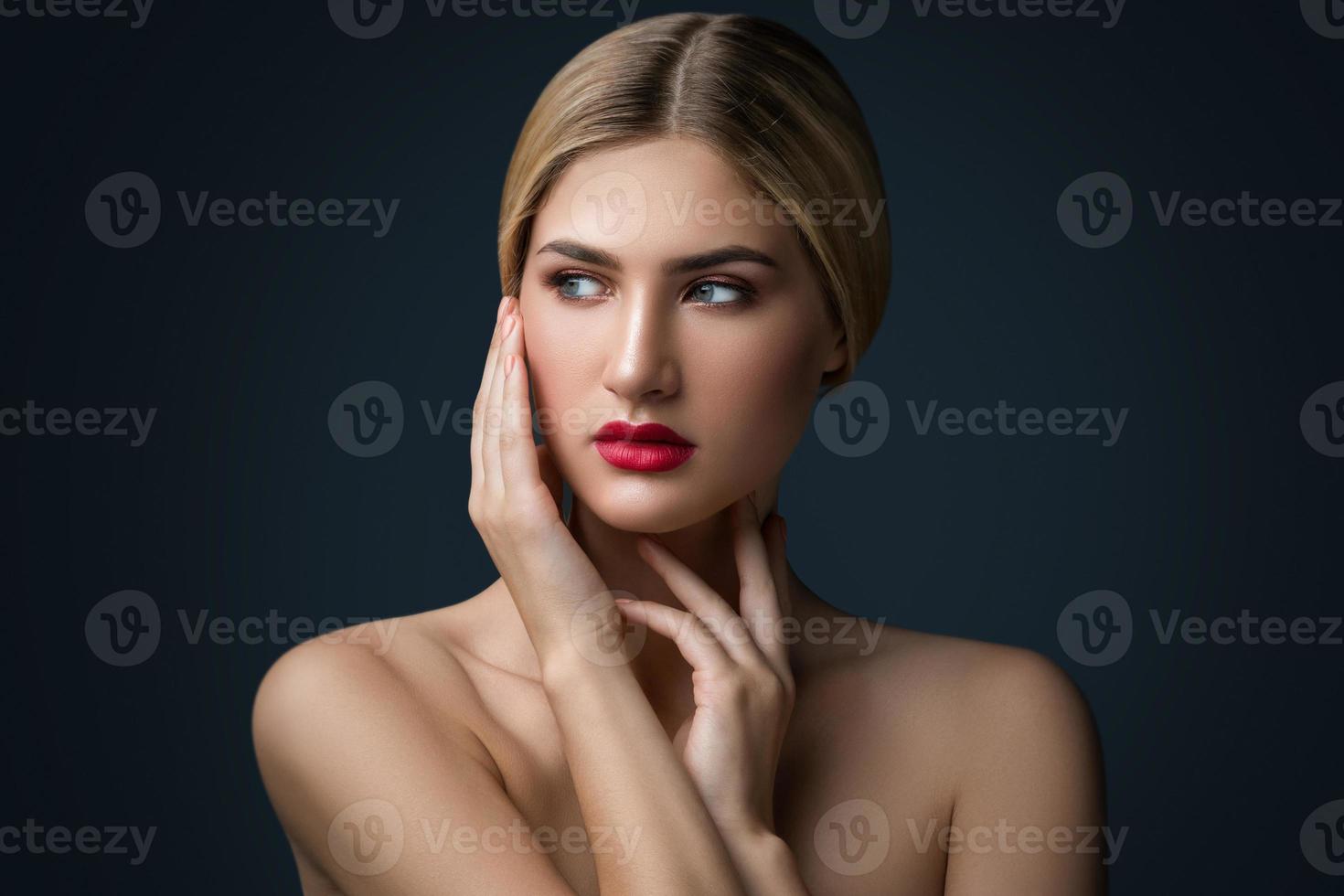 Portrait of blonde girl with red lips photo