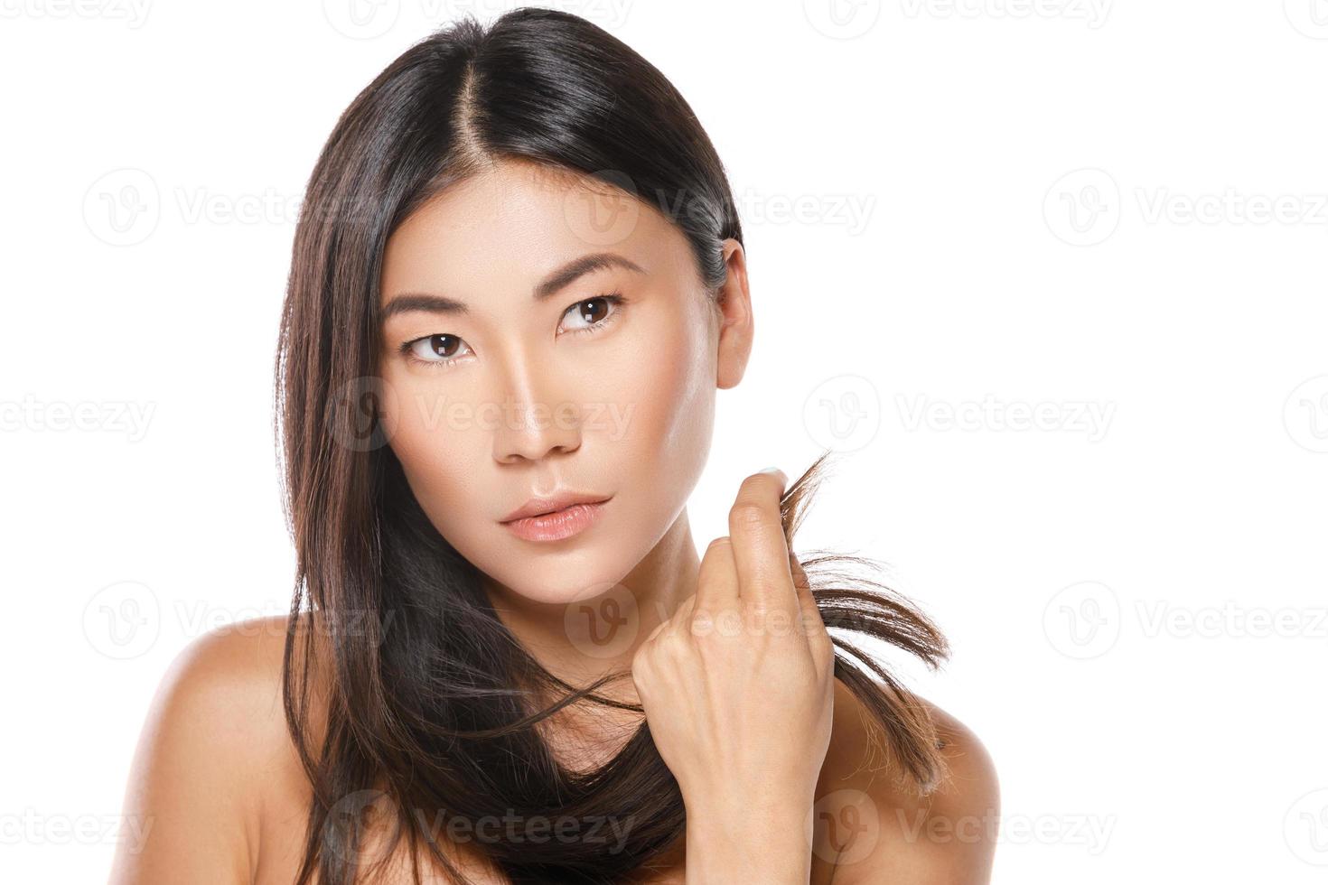 Asian woman with a healthy black hair photo