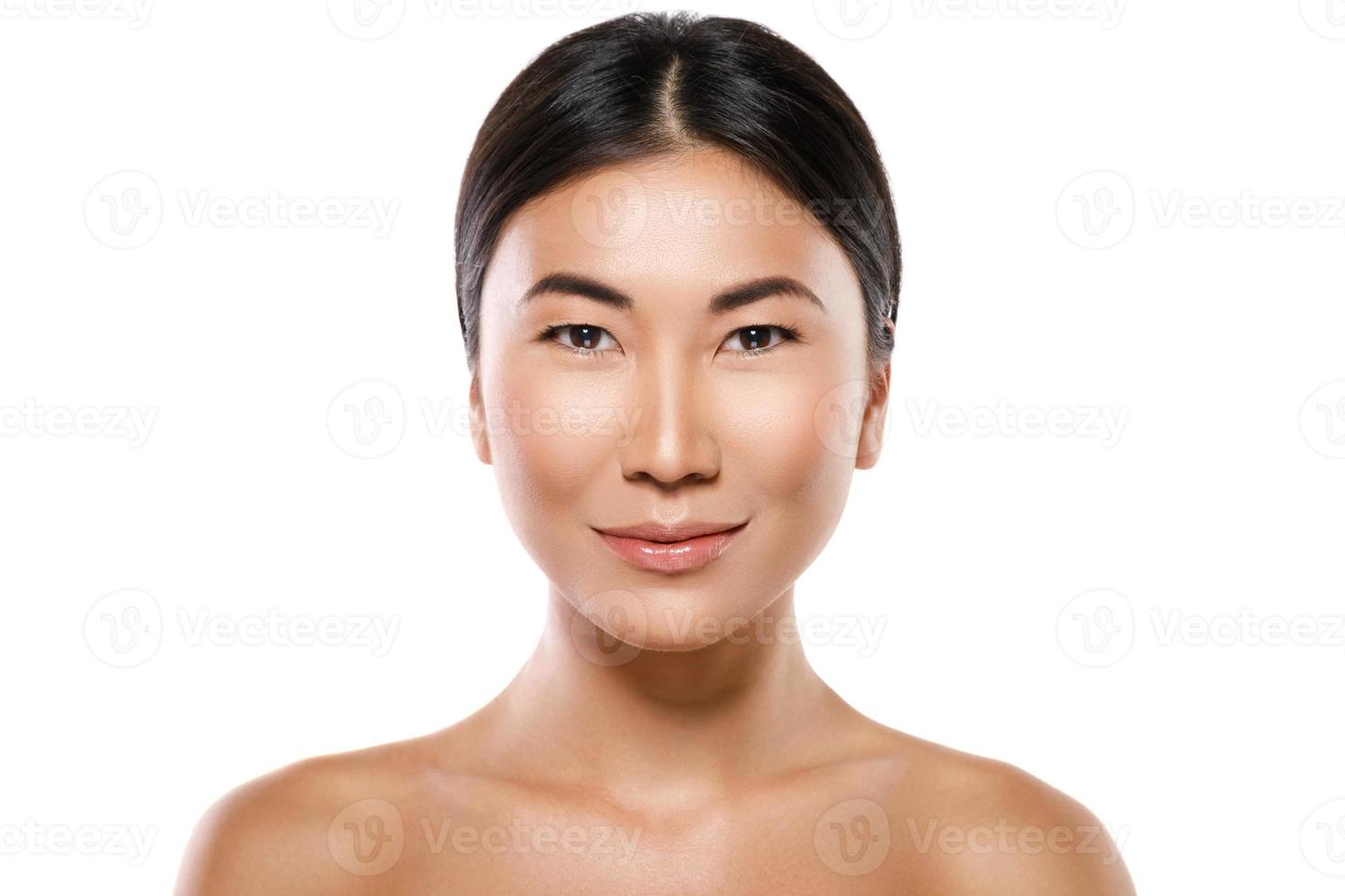 Young and beautiful asian woman on white background photo