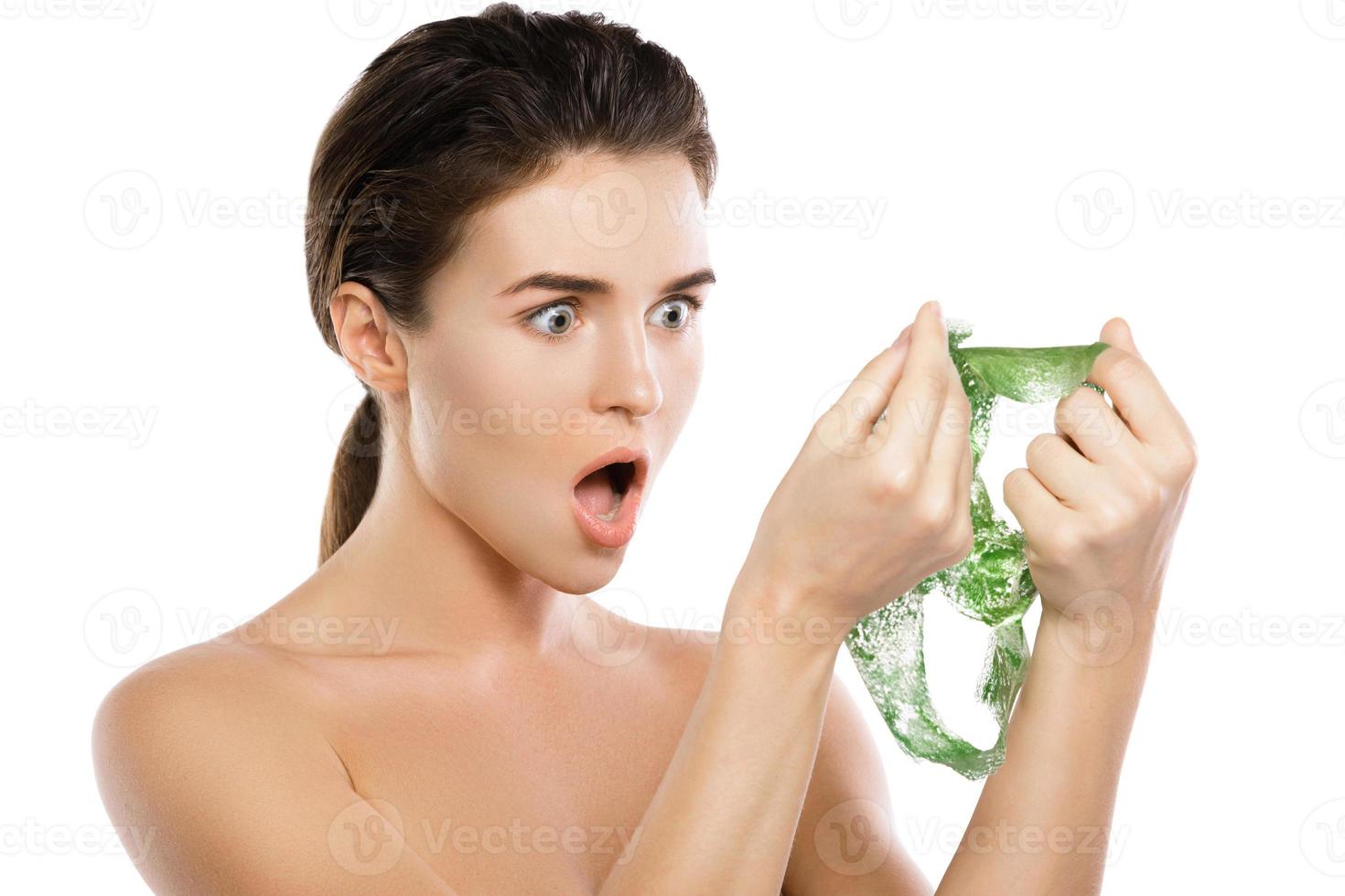 Woman with green peeloff mask on her face 16200695 Stock Photo at Vecteezy