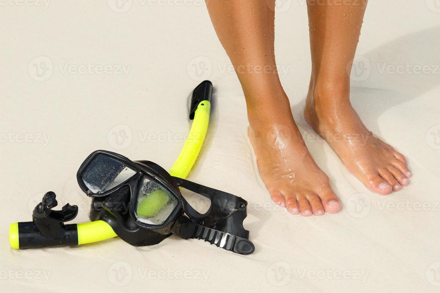 Female legs and mask for snorkeling photo