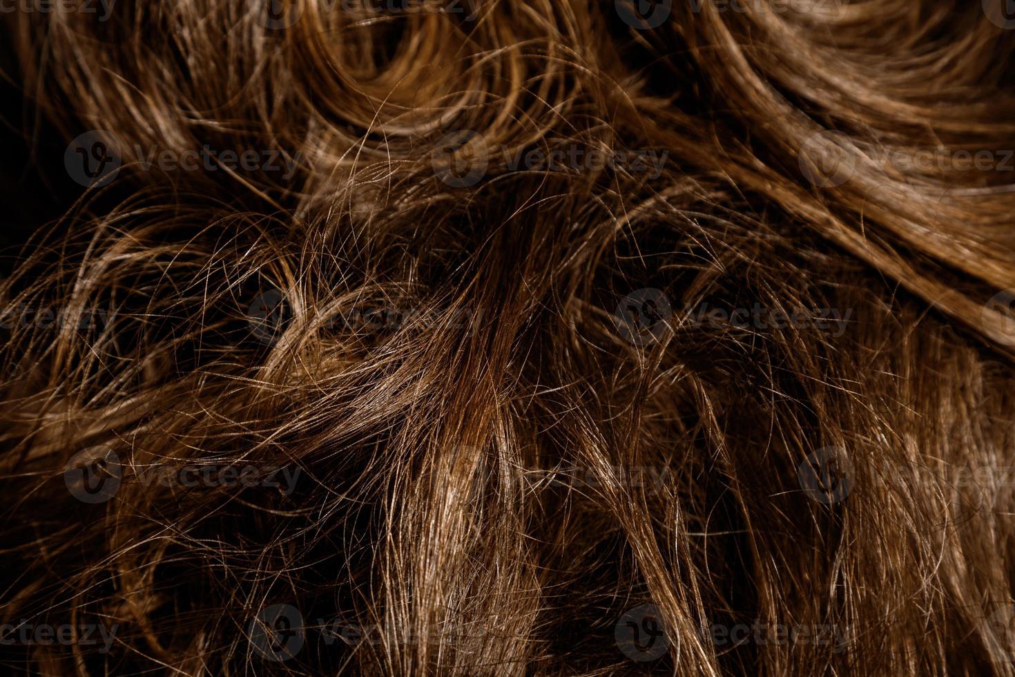 Close up of female healthy hair details photo