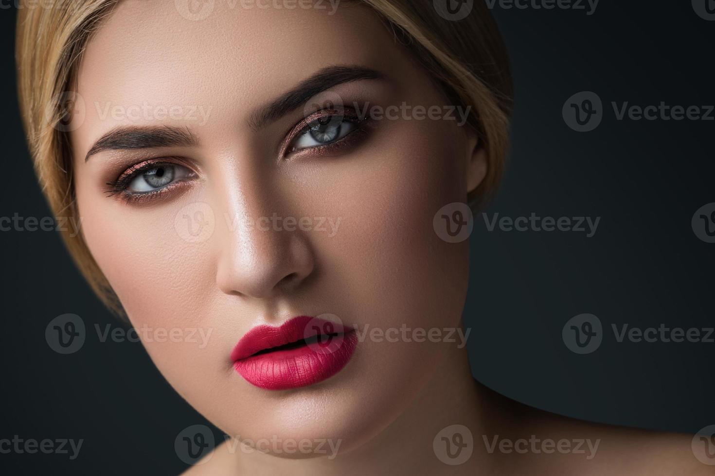 Close up portrait of beautiful blonde woman photo