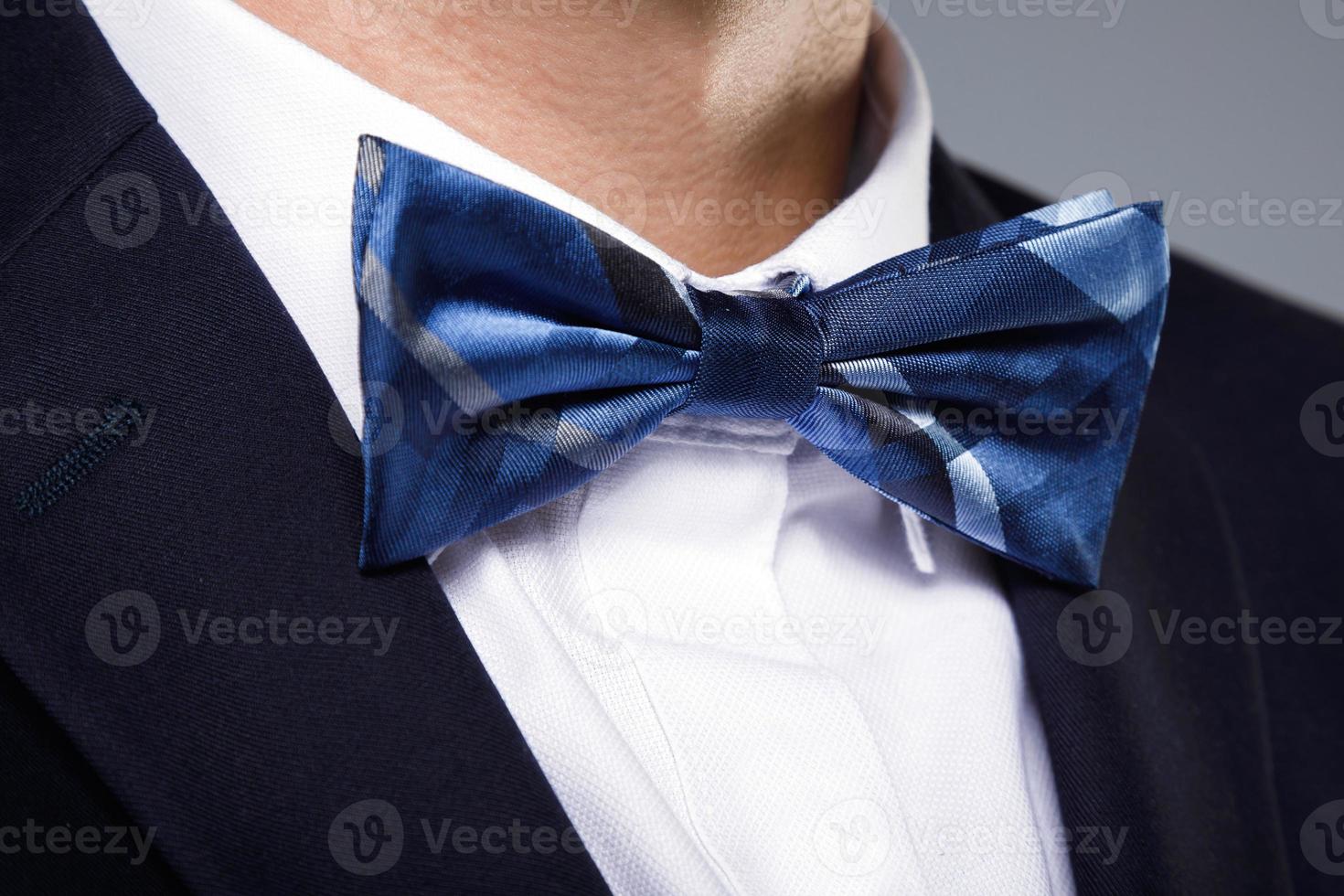 Close up of beautiful blue bow tie photo