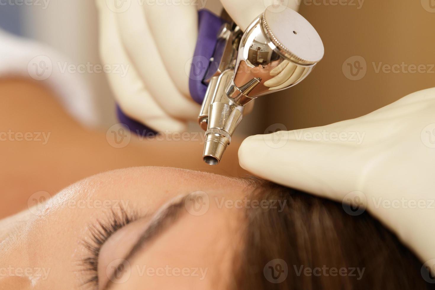 Woman in the beauty salon during Bio oxidation therapy photo