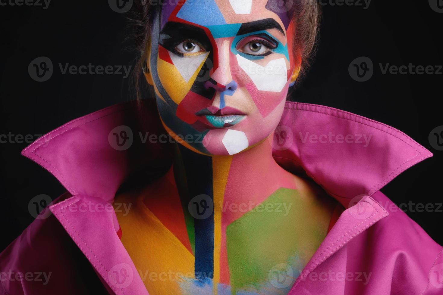 Model with a creative pop art make-up on her face photo