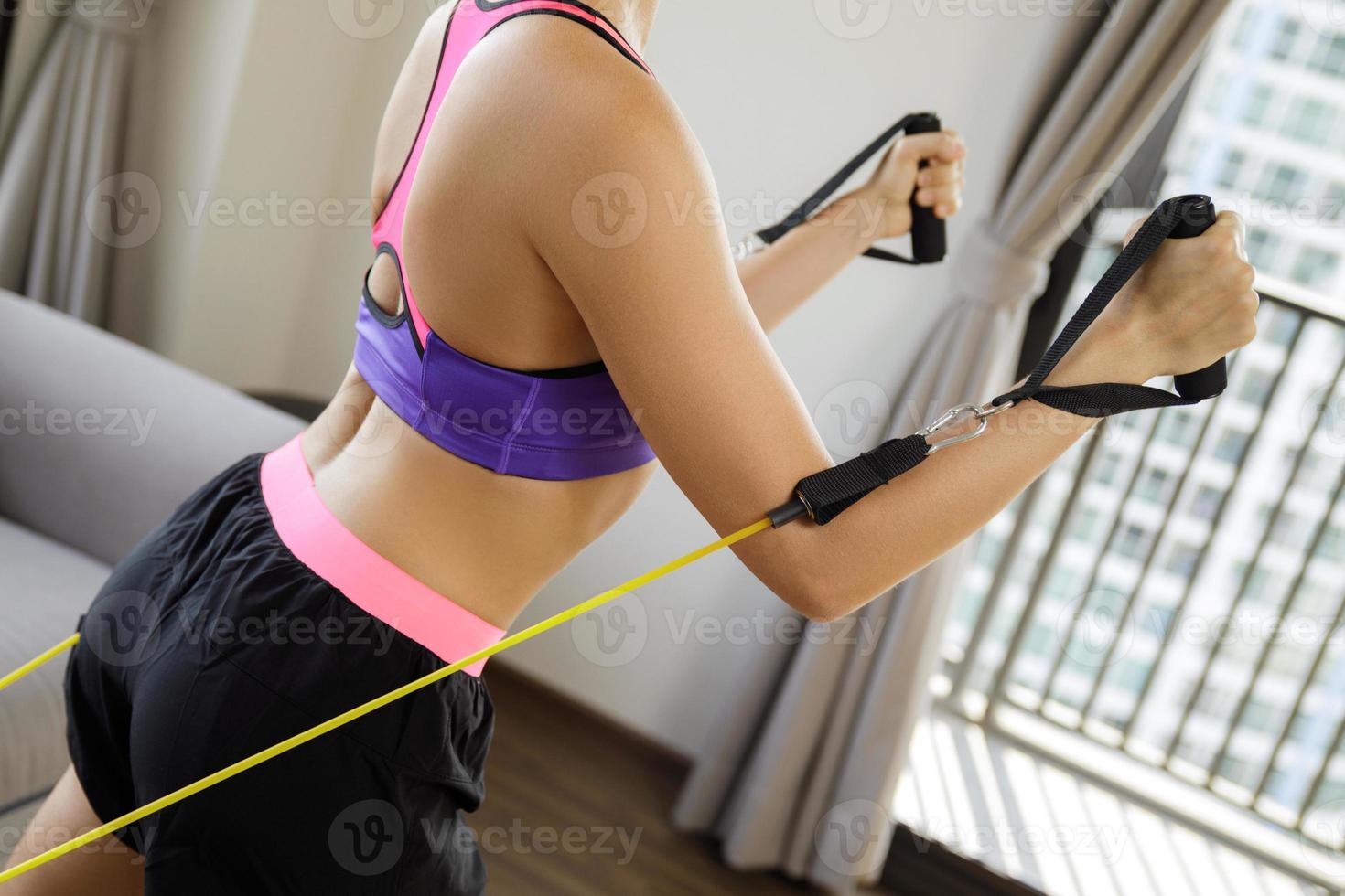 Home workout with a rubber resistance bands photo