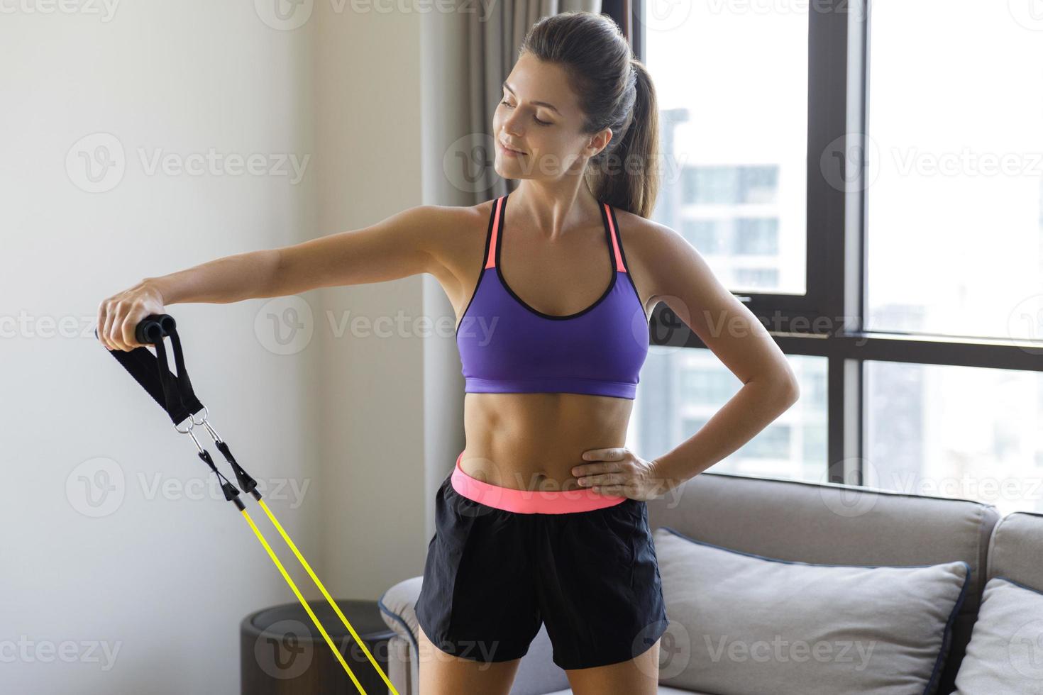 Home workout with a rubber resistance bands photo