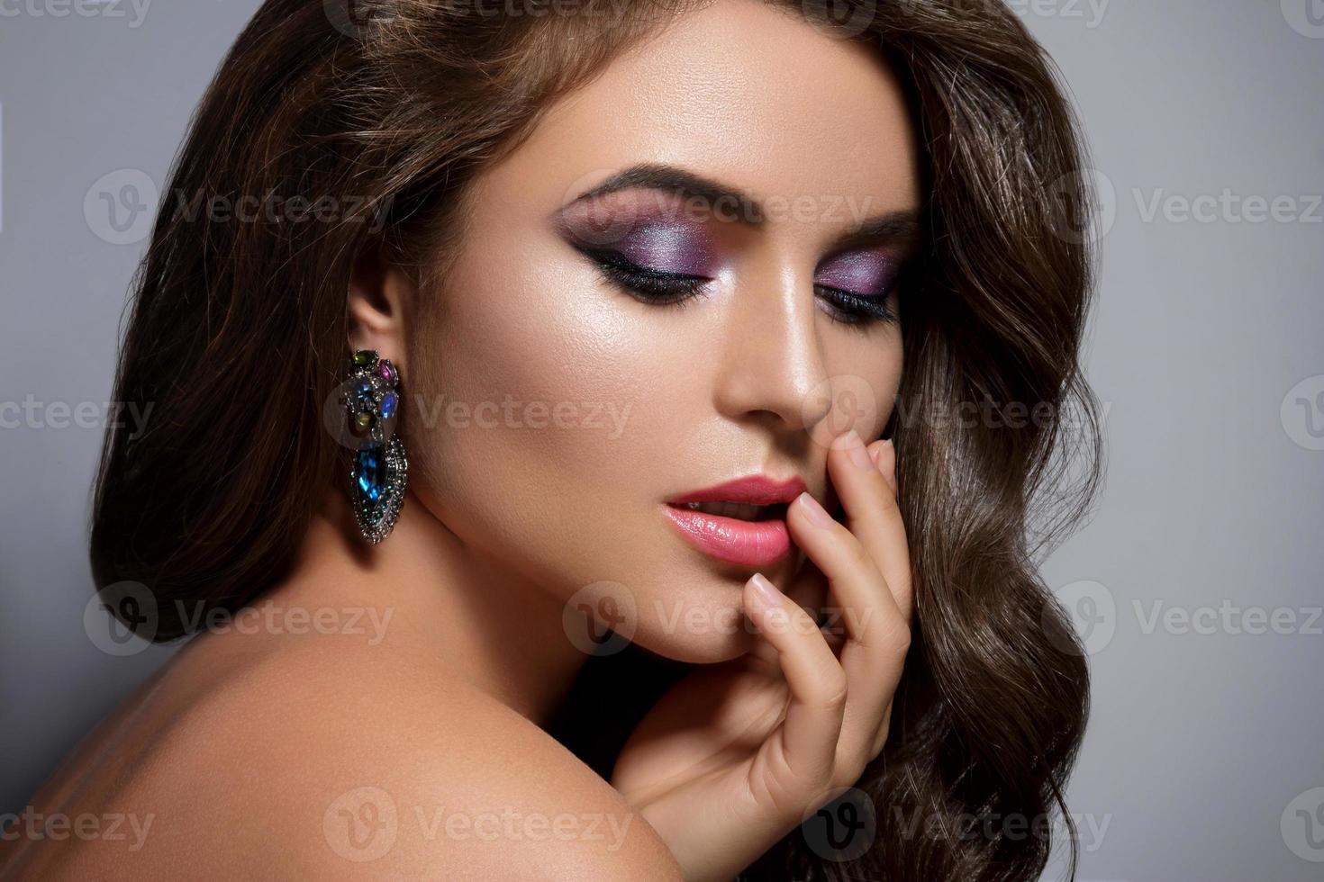 Gorgeous woman with beautiful a make-up and hairstyle photo