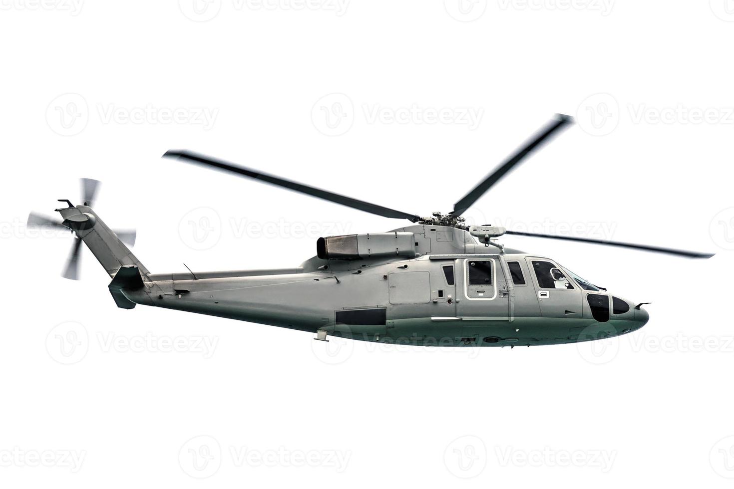 Military helicopter flying isolated on white background photo