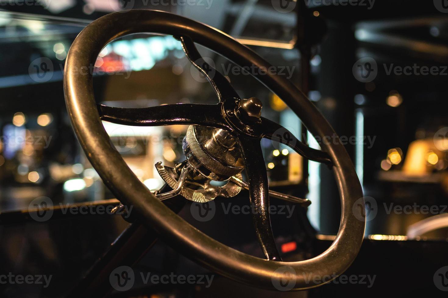 Closeup of Steering wheel of the retro steam car photo