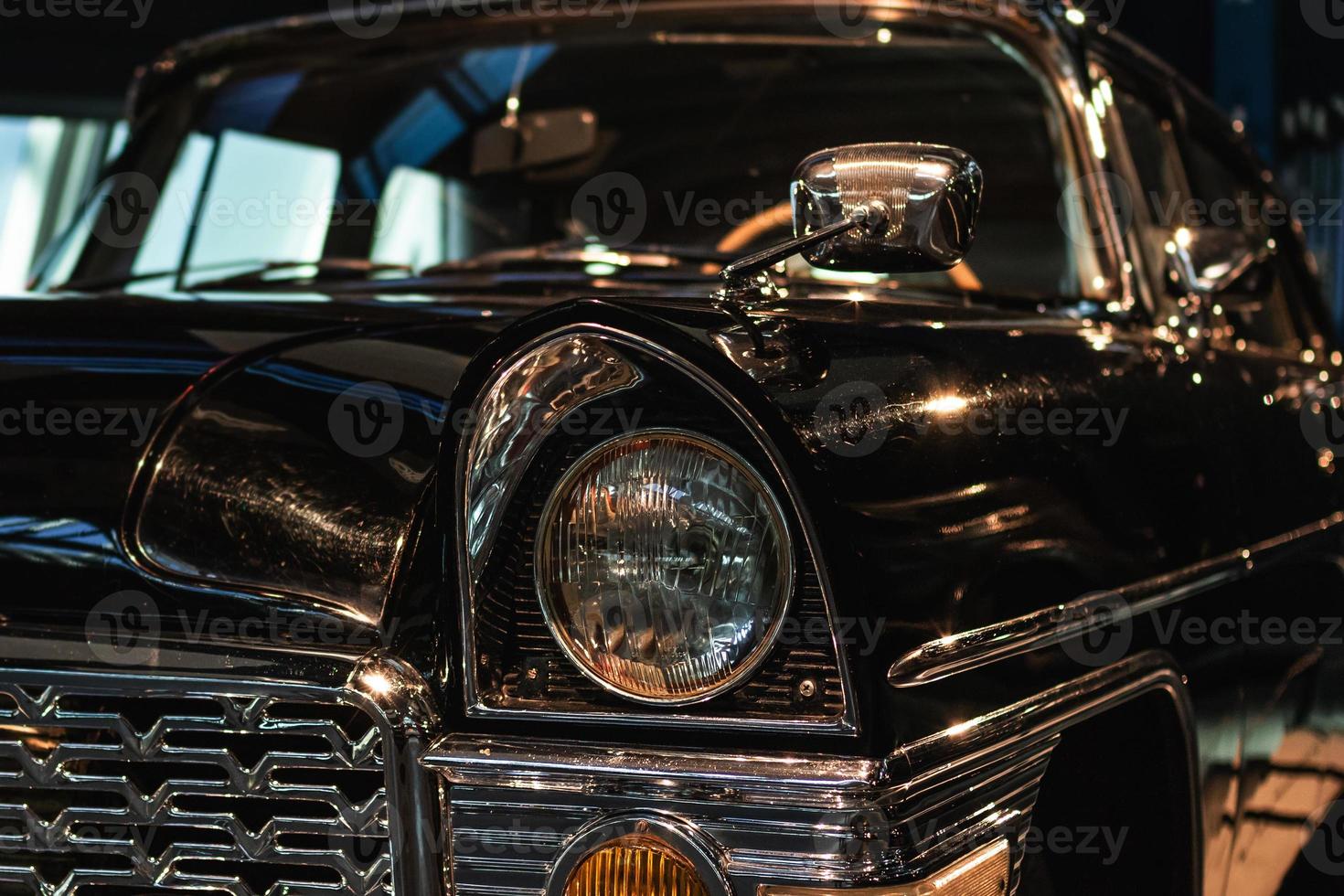 Front part of the retro car and headlight photo